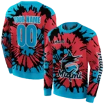 customized-miami-marlins-swirl-impact-blue-hoodie-best-selling.webp