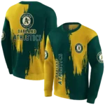 oakland-athletics-splatter-effect-green-hoodie-best-selling.webp