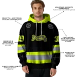 personalized-atlanta-braves-safety-motif-black-neon-green-hoodie-best-selling.webp