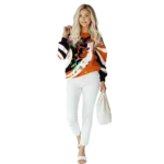 personalized-baltimore-orioles-puzzle-pieces-orange-hoodie-best-selling.webp
