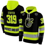 personalized-baltimore-orioles-safety-motif-black-neon-green-hoodie-best-selling.webp
