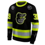 personalized-baltimore-orioles-safety-motif-black-neon-green-hoodie-best-selling.webp