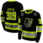 personalized-baltimore-orioles-safety-motif-black-neon-green-hoodie-best-selling.webp