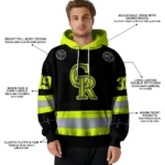 personalized-colorado-rockies-safety-motif-black-neon-green-hoodie-best-selling.webp