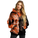 san-francisco-giants-skull-motif-orange-black-hoodie-best-selling.webp